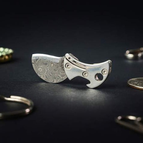 Compacte flesopener van titanium & EDC-snijder