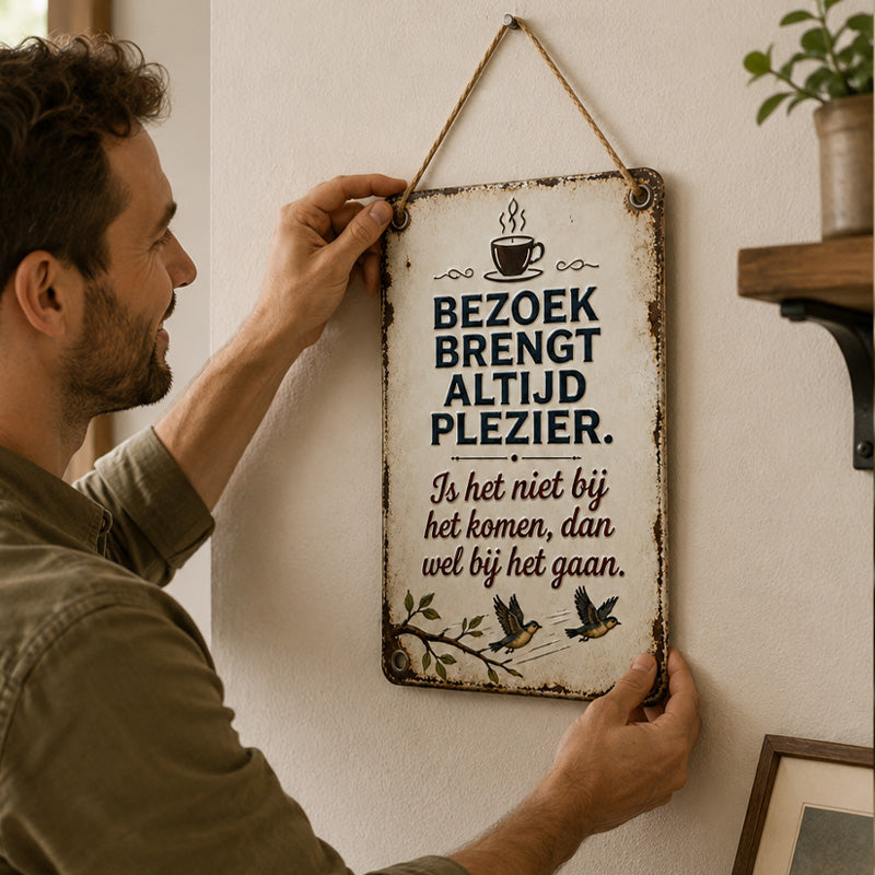 Grappig metalen bordje met een citaat van een bezoeker