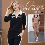 Afbeelding in Gallery-weergave laden, Tweedelig set bestaande uit een broek met V-hals, lange mouwen en wijde pijpen
