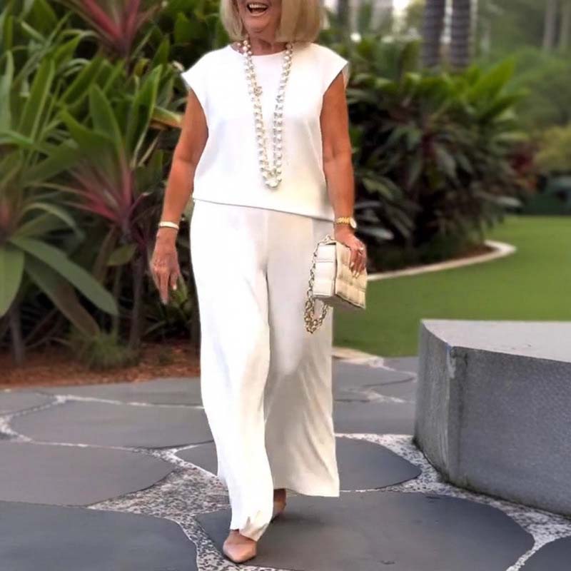 Elegant retro mouwloos tweedelig pak