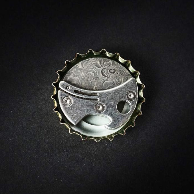 Compacte flesopener van titanium & EDC-snijder