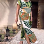 Afbeelding in Gallery-weergave laden, 🌴 Bohemian Chic Jurk met V-hals en Split – Voor Zomer &amp; Strand
