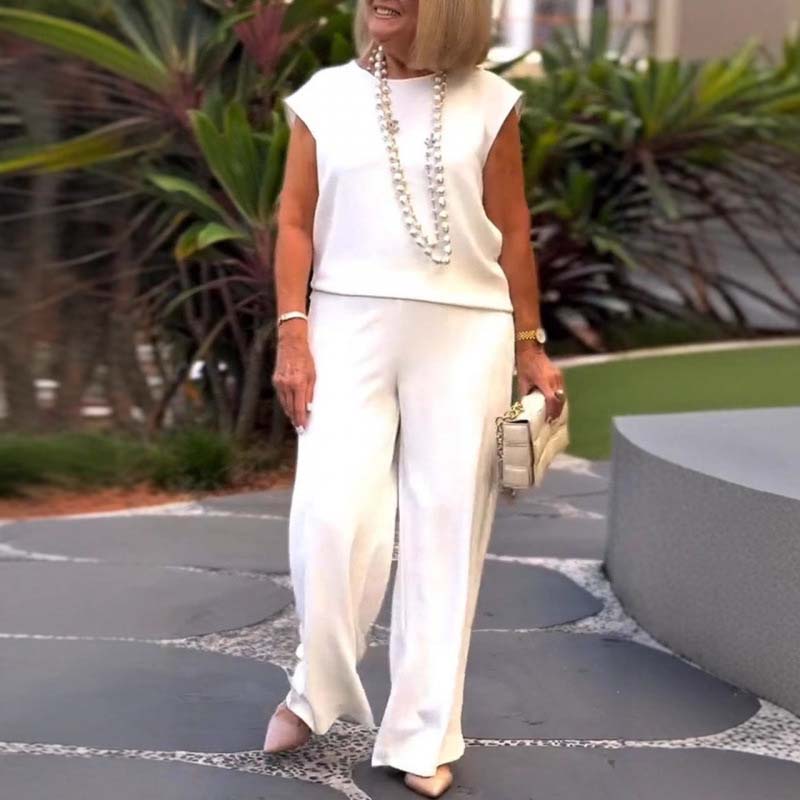 Elegant retro mouwloos tweedelig pak