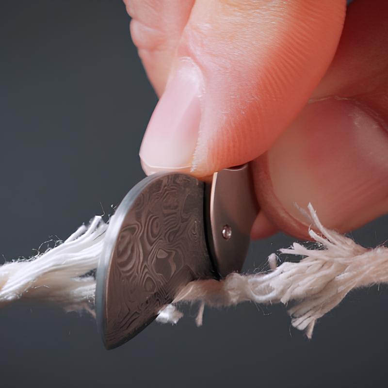 Compacte flesopener van titanium & EDC-snijder
