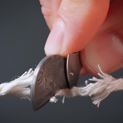 Compacte flesopener van titanium & EDC-snijder