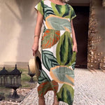 Afbeelding in Gallery-weergave laden, 🌴 Bohemian Chic Jurk met V-hals en Split – Voor Zomer &amp; Strand
