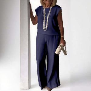 Elegant retro mouwloos tweedelig pak