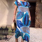 Afbeelding in Gallery-weergave laden, 🌴 Bohemian Chic Jurk met V-hals en Split – Voor Zomer &amp; Strand
