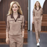 Afbeelding in Gallery-weergave laden, Tweedelig set bestaande uit een broek met V-hals, lange mouwen en wijde pijpen
