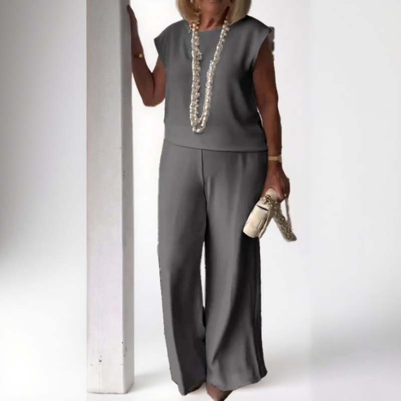 Elegant retro mouwloos tweedelig pak