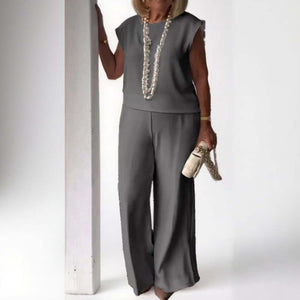 Elegant retro mouwloos tweedelig pak