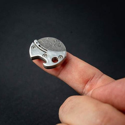 Compacte flesopener van titanium & EDC-snijder