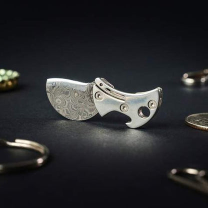 Compacte flesopener van titanium & EDC-snijder